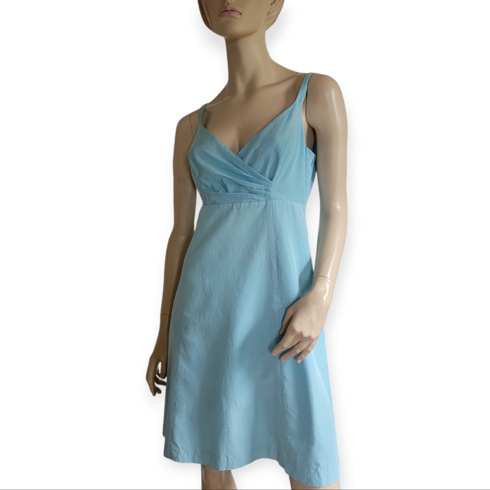Glint open wrap pleated sleeveless dress